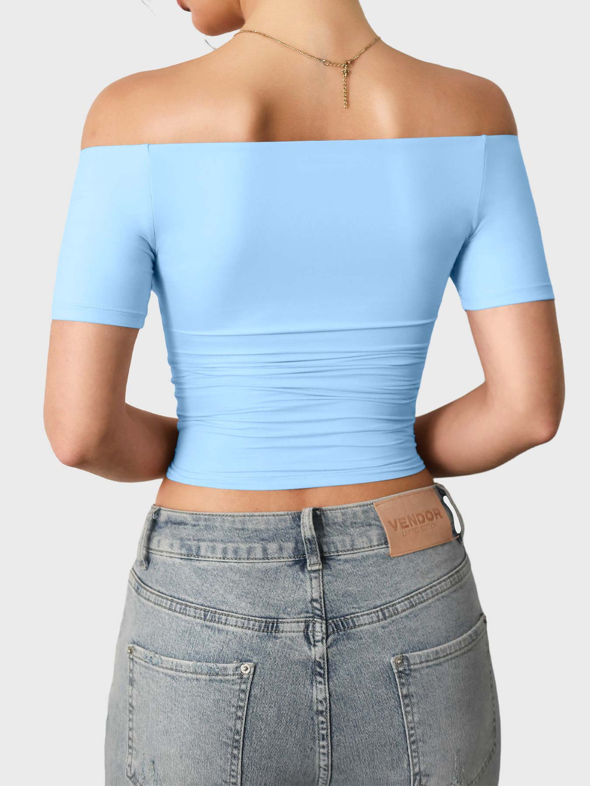 Top Luzlie con spalle scoperte a manica corta